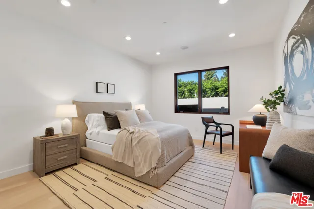 a kitchen with a sink and refrigerator