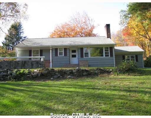 422 Cherry Brook Road Canton, CT 06019 - Photo 1 of 1 a front view of a house with a yard