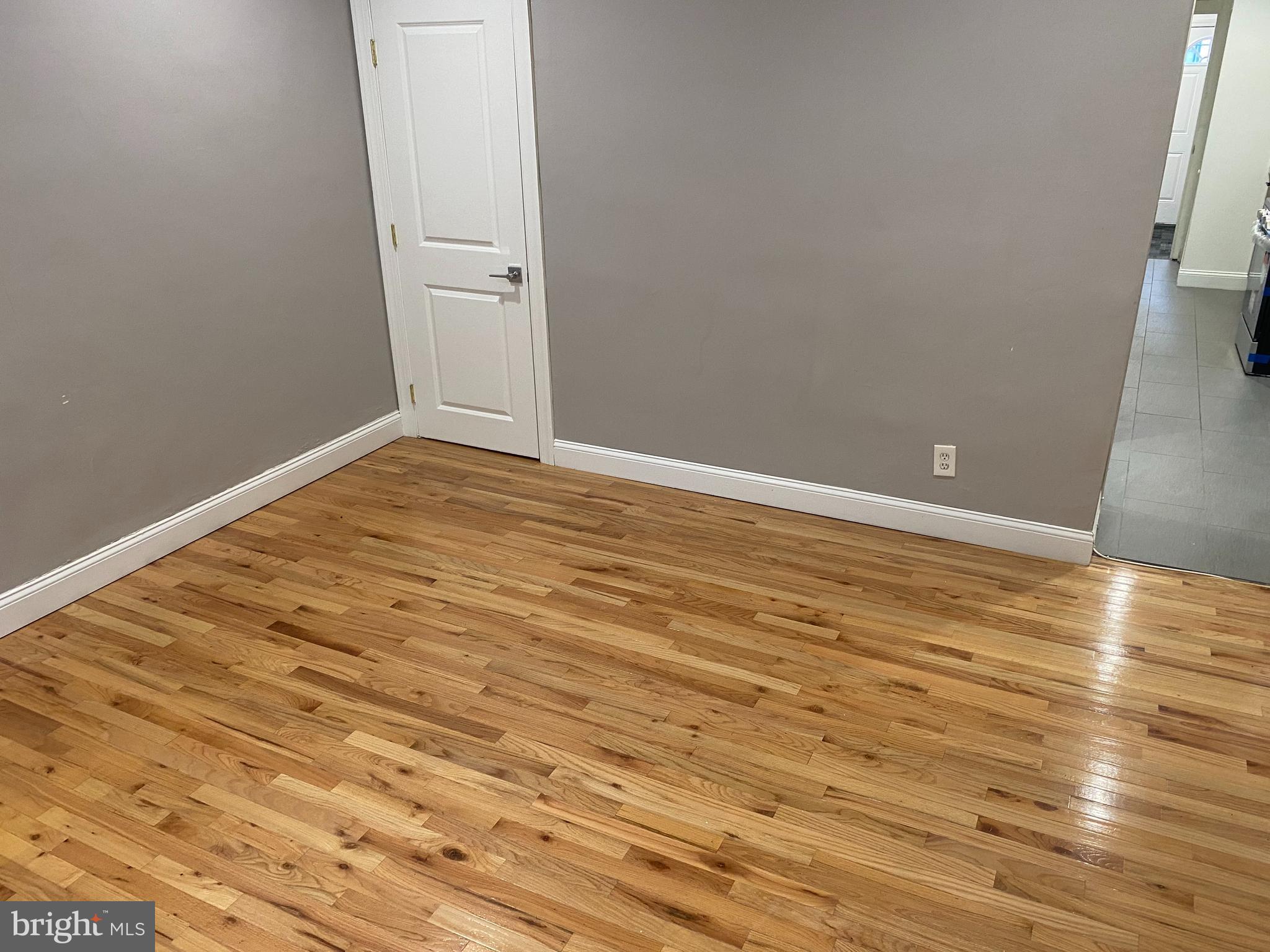 1122 Penn Street Northeast, Unit 1 Washington, DC 20002 - Photo 4 of 31 a view of empty room with wooden floor