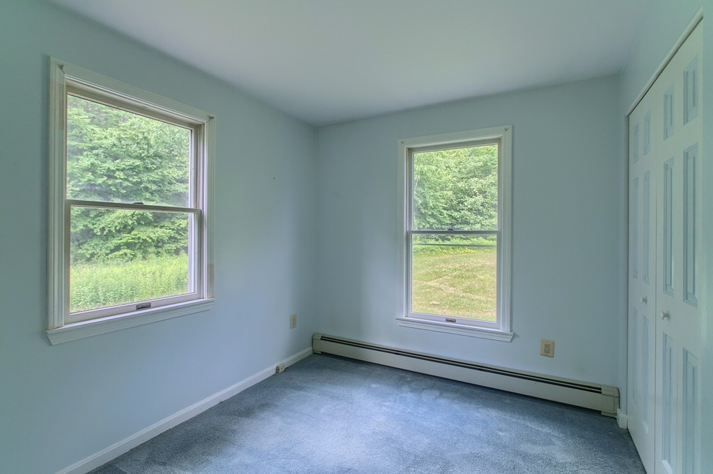 16 Clement Road Townsend, MA 01474 - Photo 10 of 19 a view of an empty room with a window