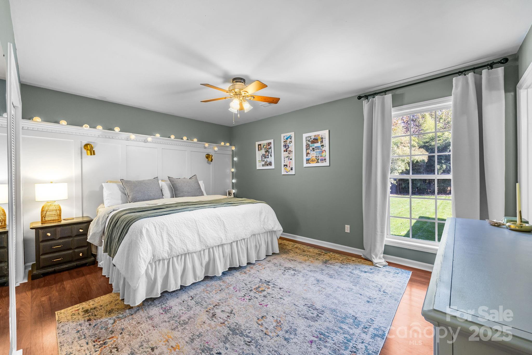 3512 Cross Winds Road Charlotte, NC 28227 - Photo 12 of 32 a spacious bedroom with a bed and a large window