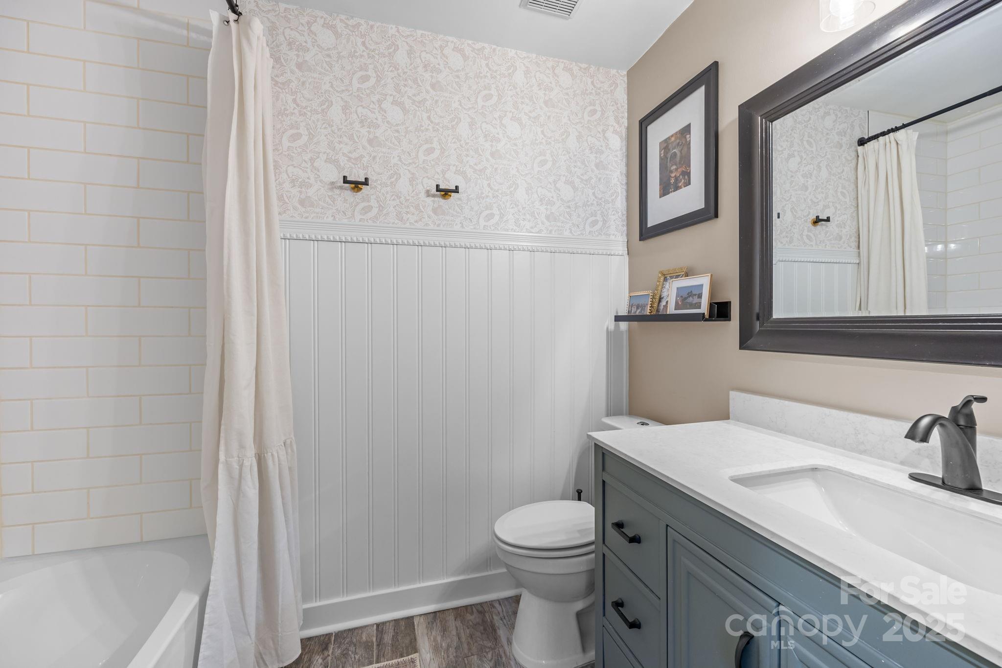 3512 Cross Winds Road Charlotte, NC 28227 - Photo 17 of 32 a bathroom with a granite countertop sink toilet and shower