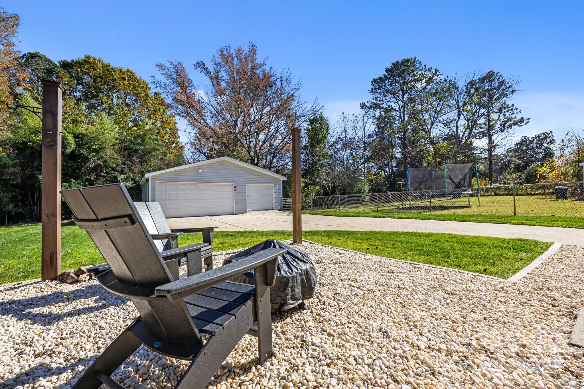 3512 Cross Winds Road Charlotte, NC 28227 - Photo 27 of 32 a view of backyard with seating area and trees