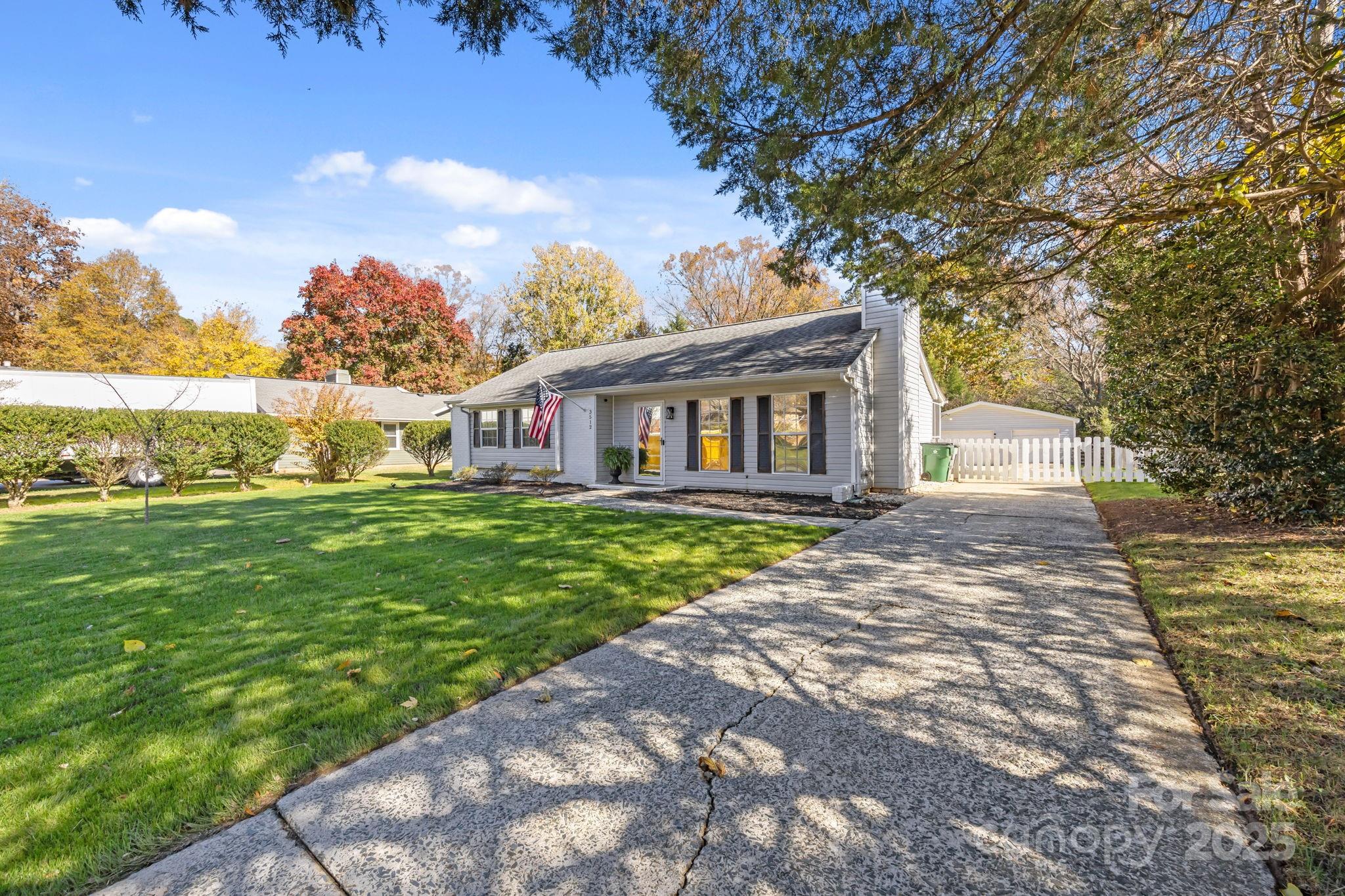 3512 Cross Winds Road Charlotte, NC 28227 - Photo 31 of 32 a view of a house with a backyard