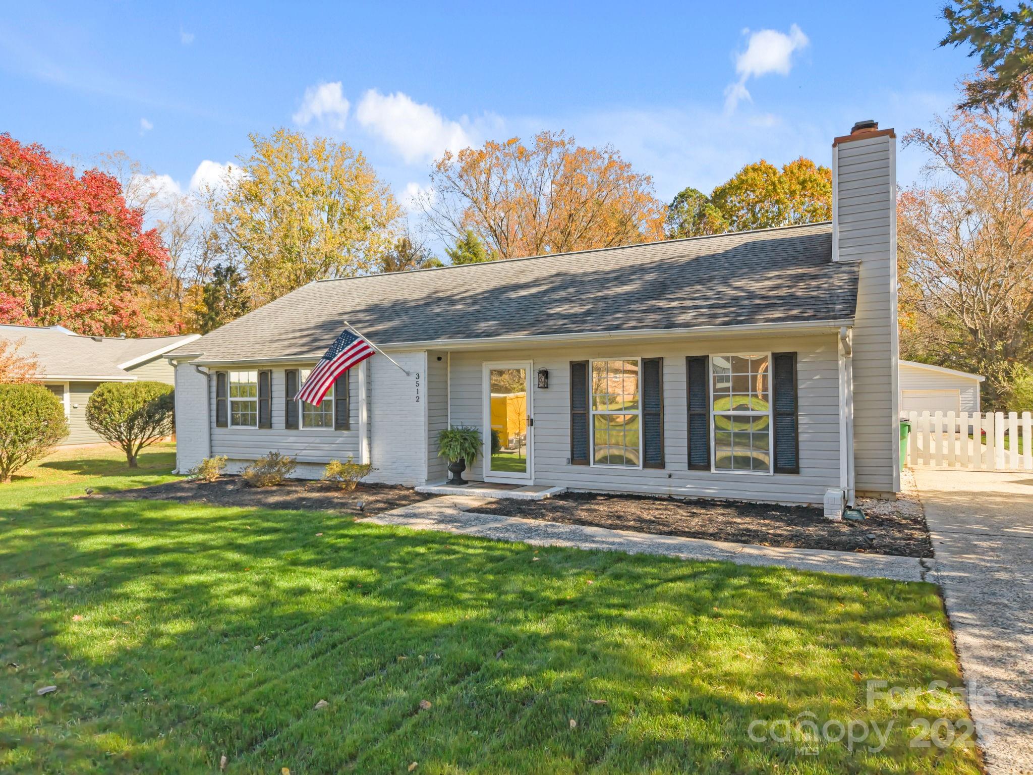 3512 Cross Winds Road Charlotte, NC 28227 - Photo 32 of 32 a front view of a house with a yard