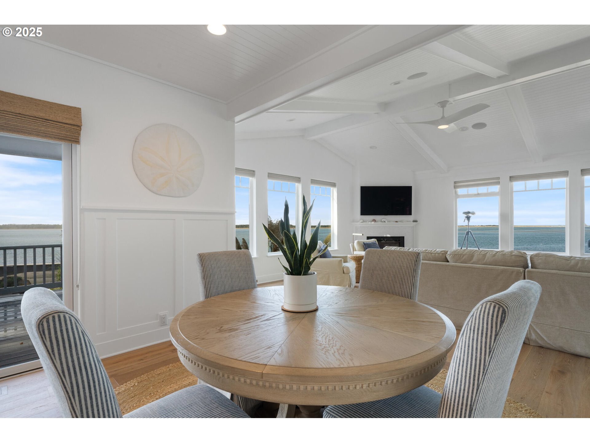 3375 Netarts Bay Drive Netarts, OR 97141 - Photo 11 of 48 a dining room with furniture and wooden floor
