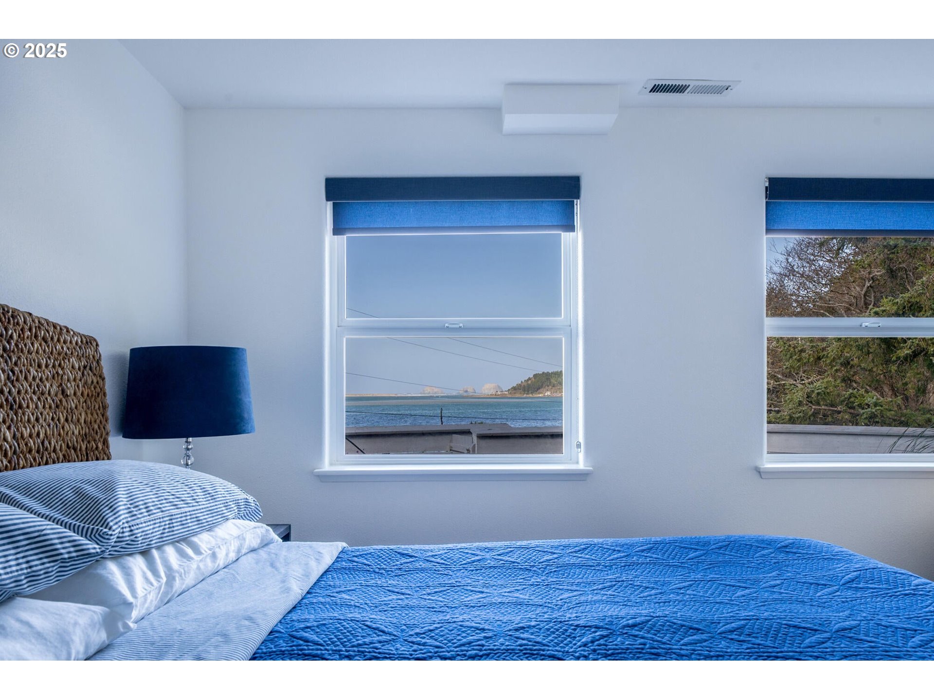 3375 Netarts Bay Drive Netarts, OR 97141 - Photo 35 of 48 a living room with a bed and a window