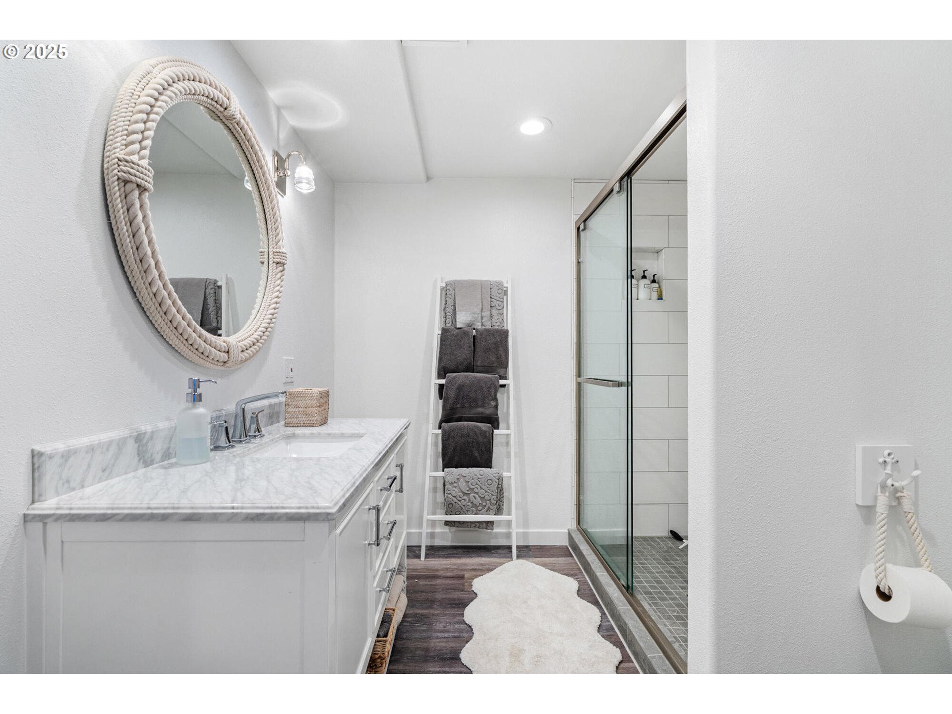 3375 Netarts Bay Drive Netarts, OR 97141 - Photo 36 of 48 a bathroom with a sink and a mirror