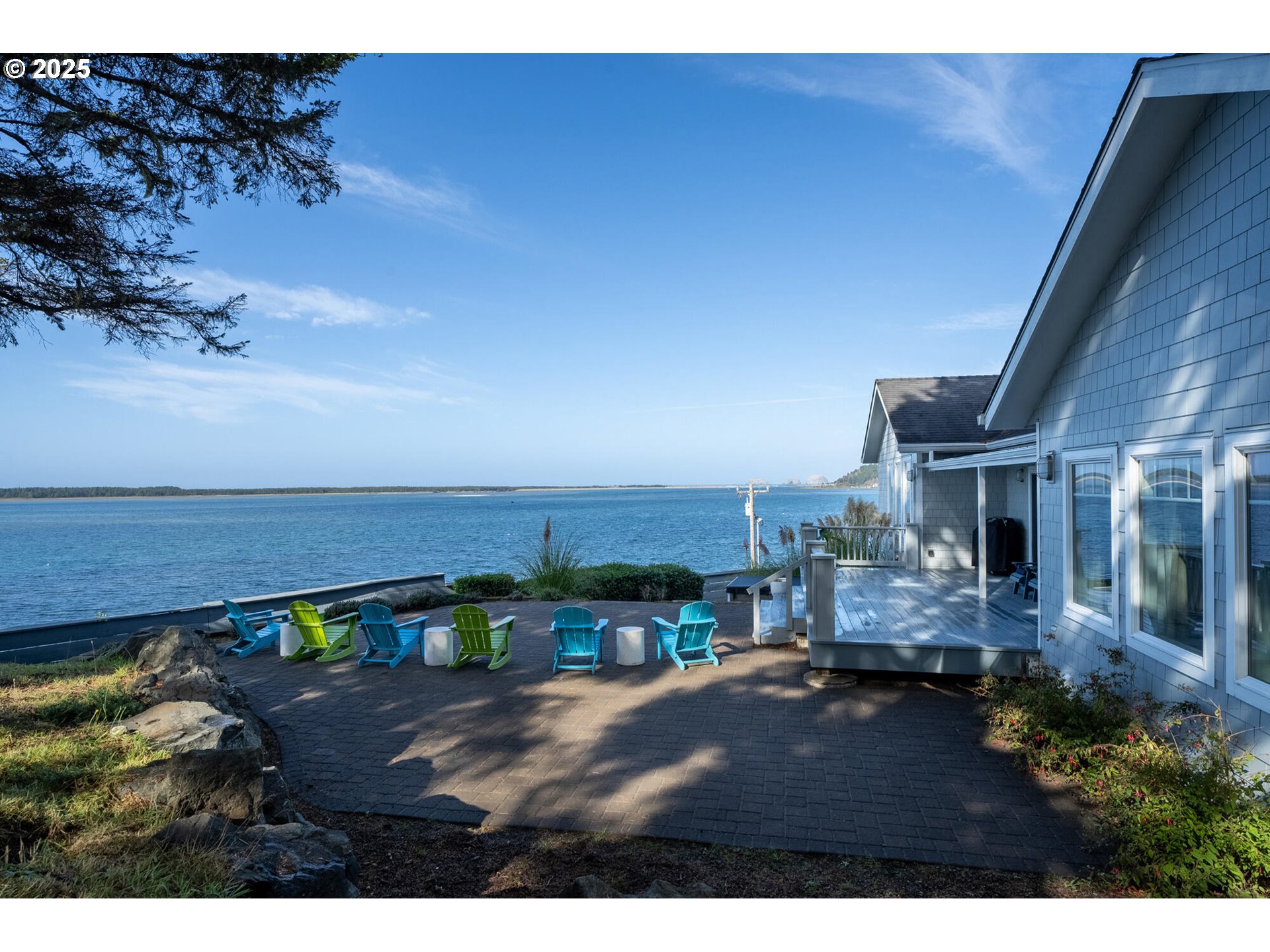 3375 Netarts Bay Drive Netarts, OR 97141 - Photo 37 of 48 a balcony with furniture and a table