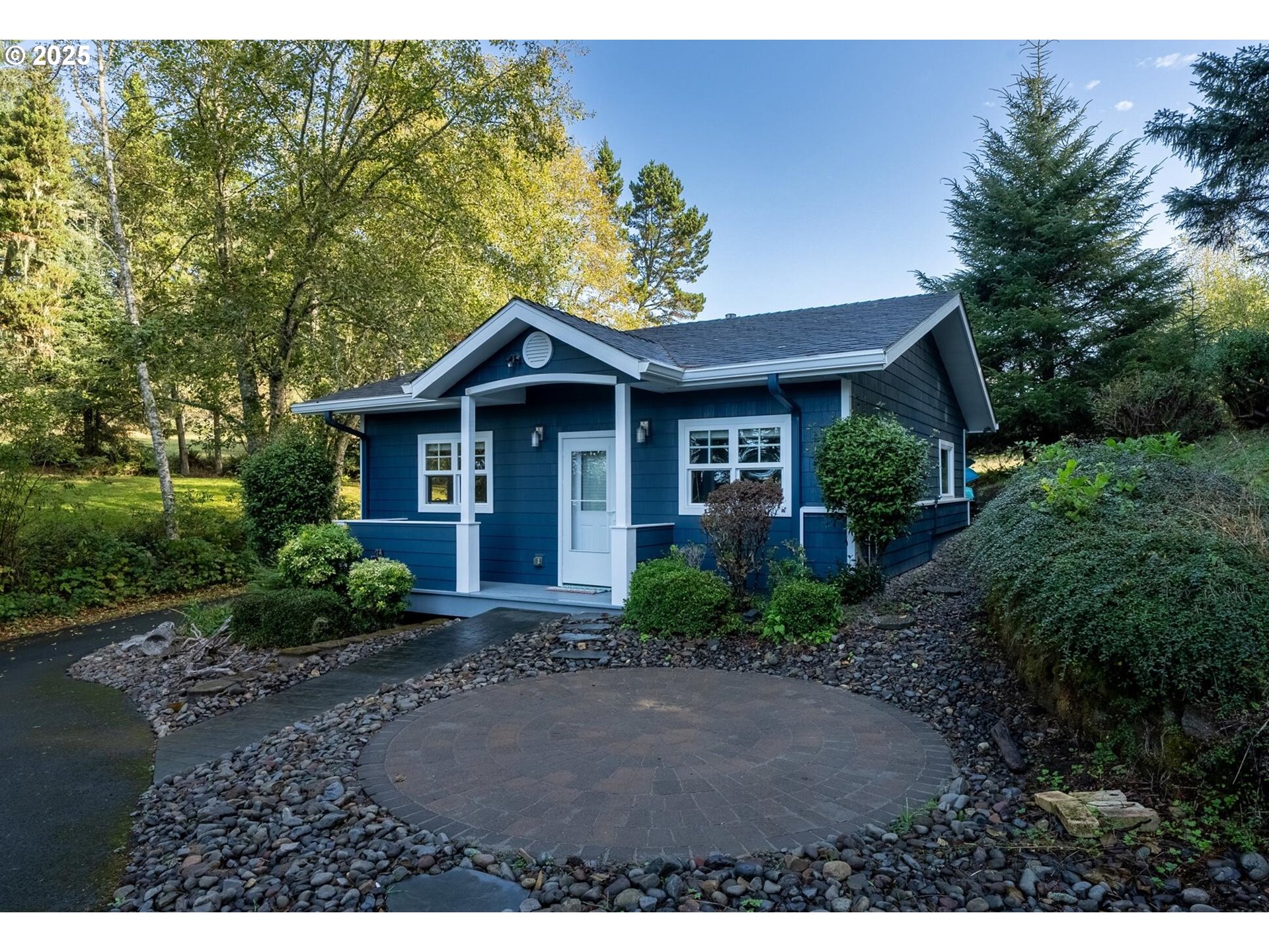 3375 Netarts Bay Drive Netarts, OR 97141 - Photo 41 of 48 a front view of a house with a garden