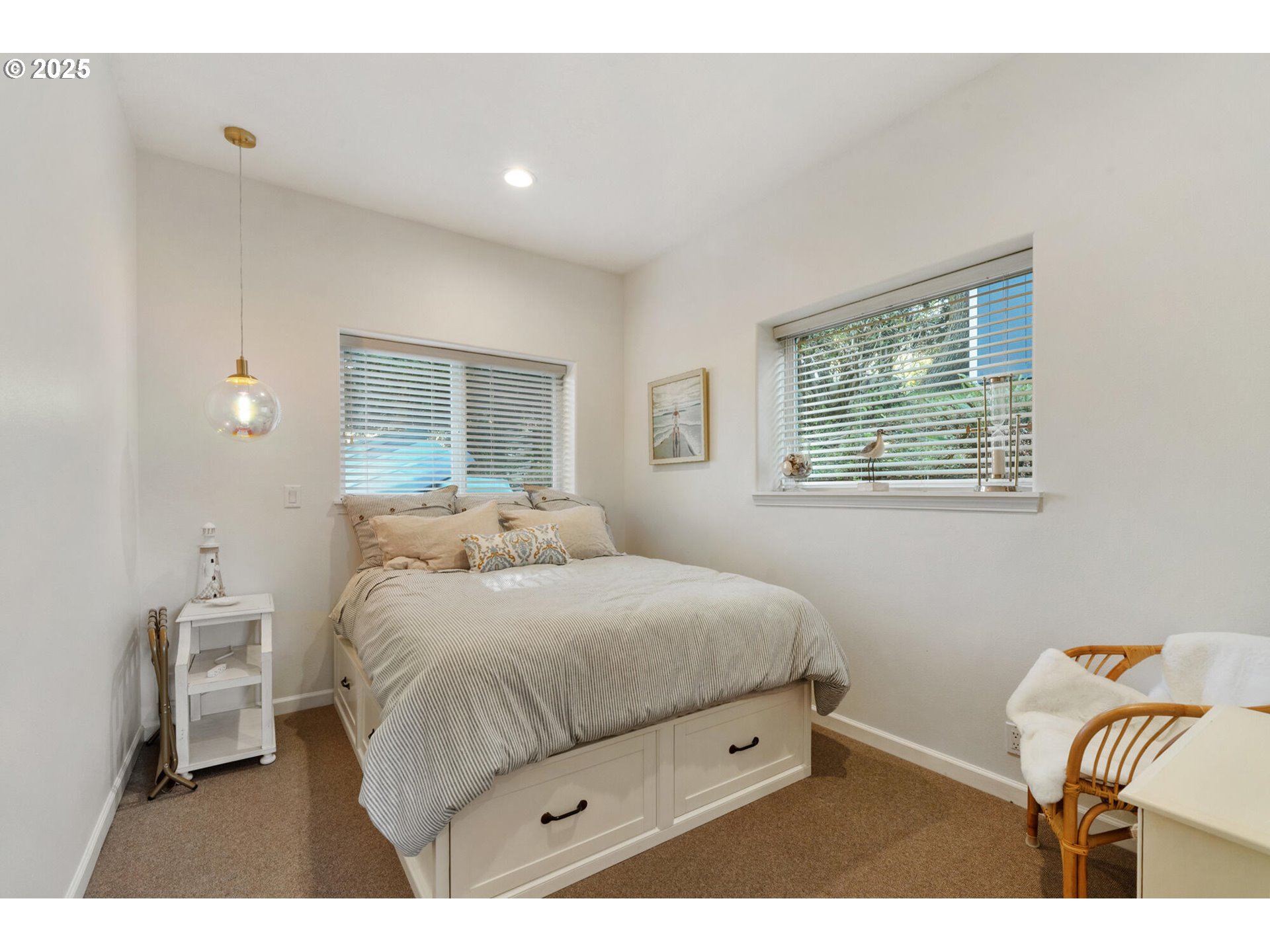 3375 Netarts Bay Drive Netarts, OR 97141 - Photo 46 of 48 a bedroom with a bed and a table