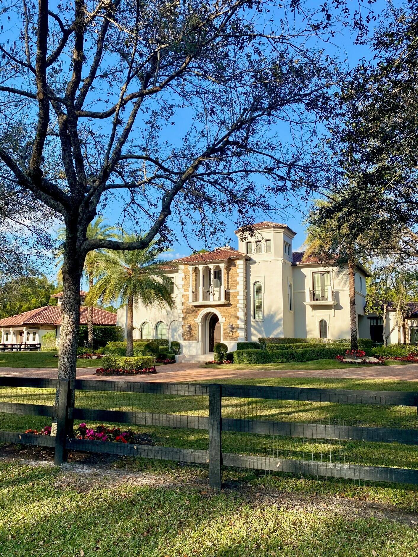 1382 Pelham Road Wellington, FL 33414 - Photo 1 of 59 front view