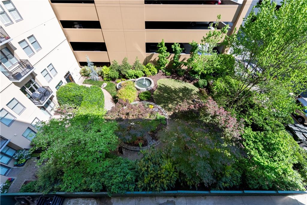 201 West Ponce De Leon Avenue, Unit 502 Decatur, GA 30030 - Photo 18 of 49 an aerial view of residential house with outdoor space and trees all around