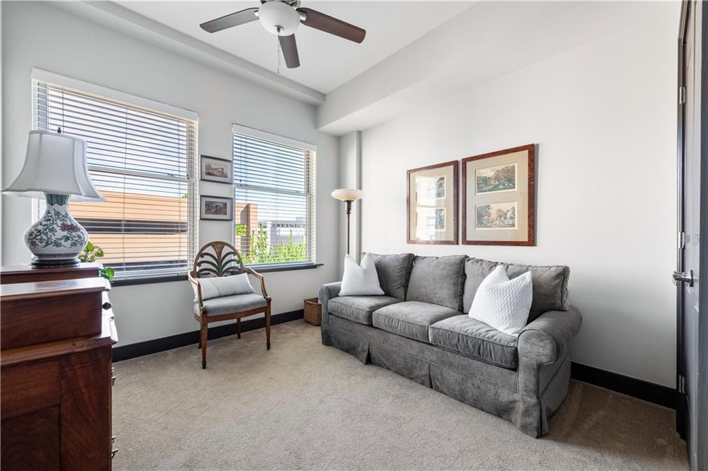 201 West Ponce De Leon Avenue, Unit 502 Decatur, GA 30030 - Photo 26 of 49 a living room with furniture and a window