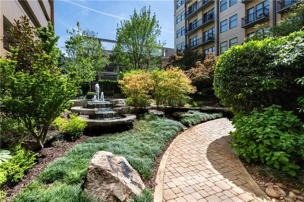 201 West Ponce De Leon Avenue, Unit 502 Decatur, GA 30030 - Photo 47 of 49 a view of a fountain in front of buildings