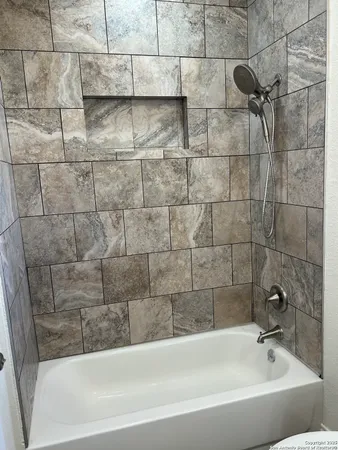 a bathroom with a bathtub