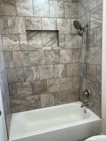 a bathroom with a bathtub