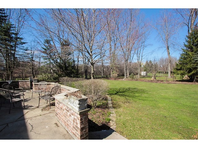 44 Farnham Road Lake Forest, IL 60045 - Photo 24 of 25 a view of yard with swimming pool and trees