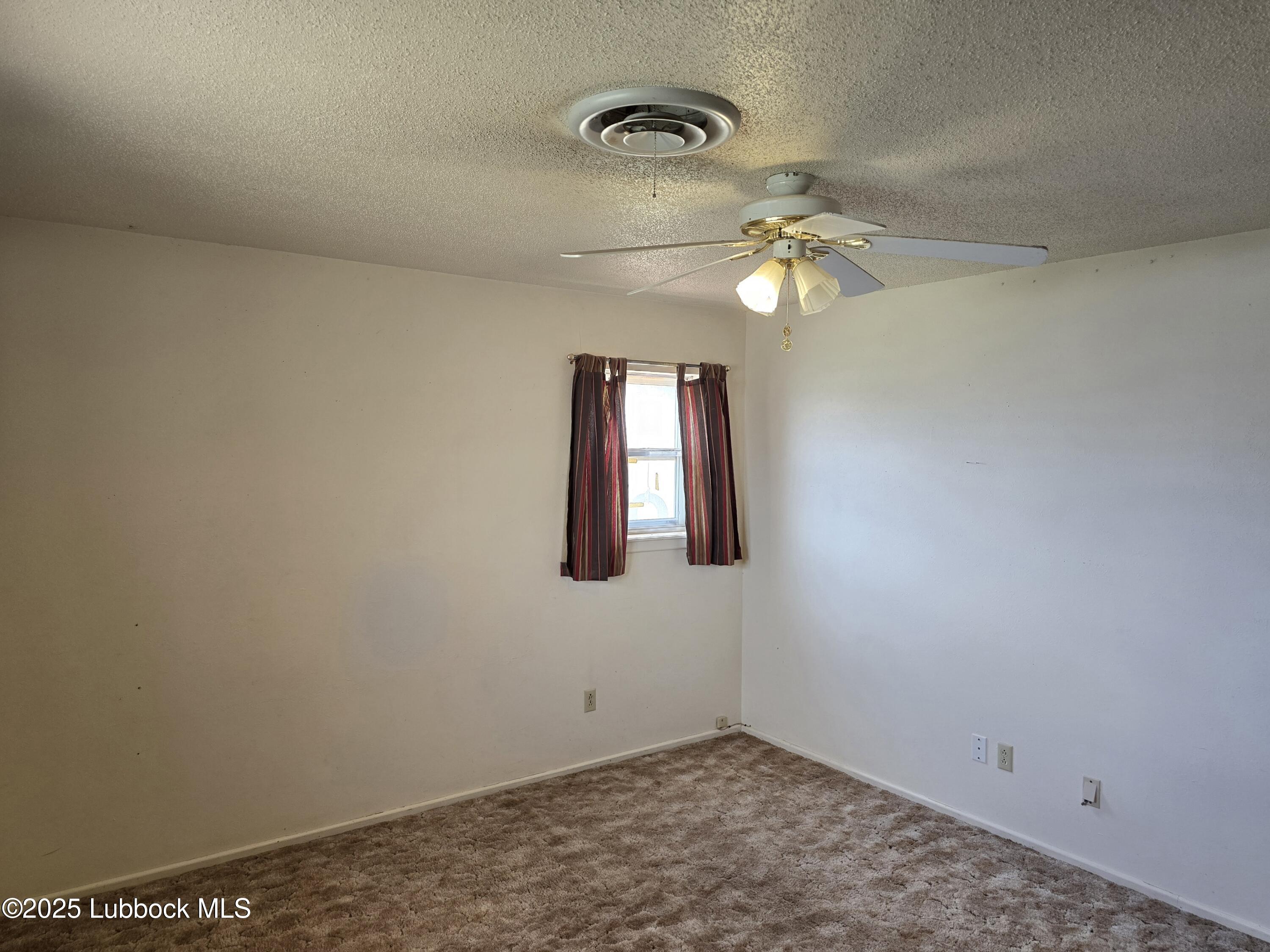 1681 Co Road Denver City, TX 79323 - Photo 17 of 30 a window in an empty room