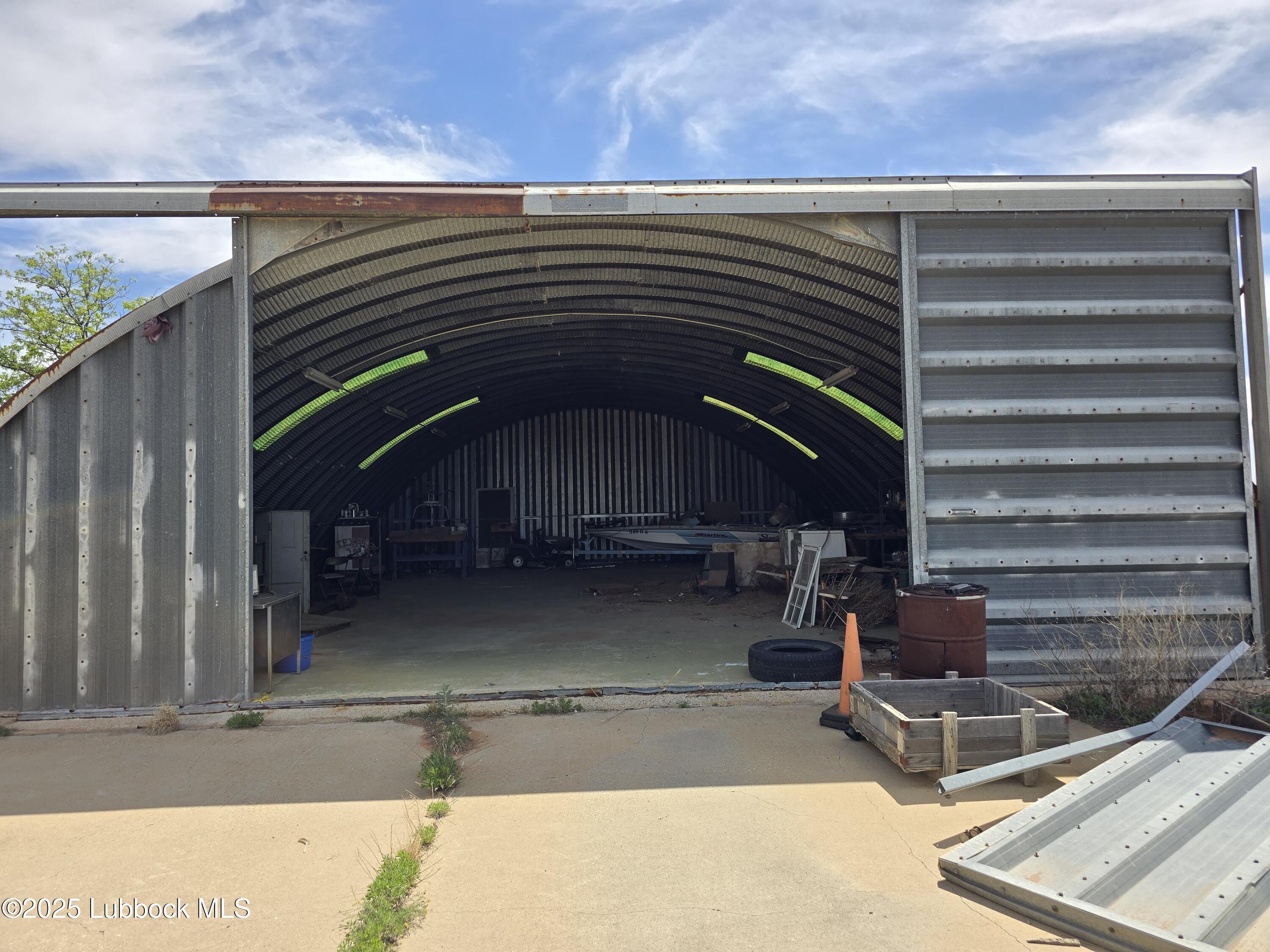 1681 Co Road Denver City, TX 79323 - Photo 28 of 30 a view of a house with a patio