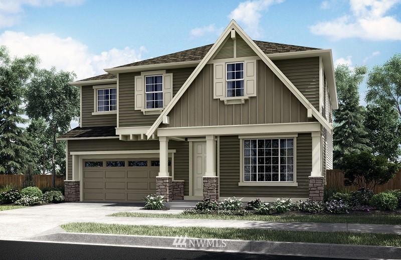 22262 9th Drive Southeast, Unit 7S Bothell, WA 98021 - Photo 1 of 2 a front view of a house with a yard
