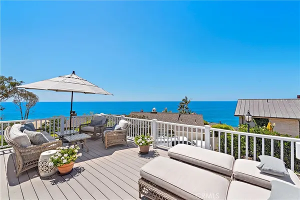 a view of a patio with wooden floor