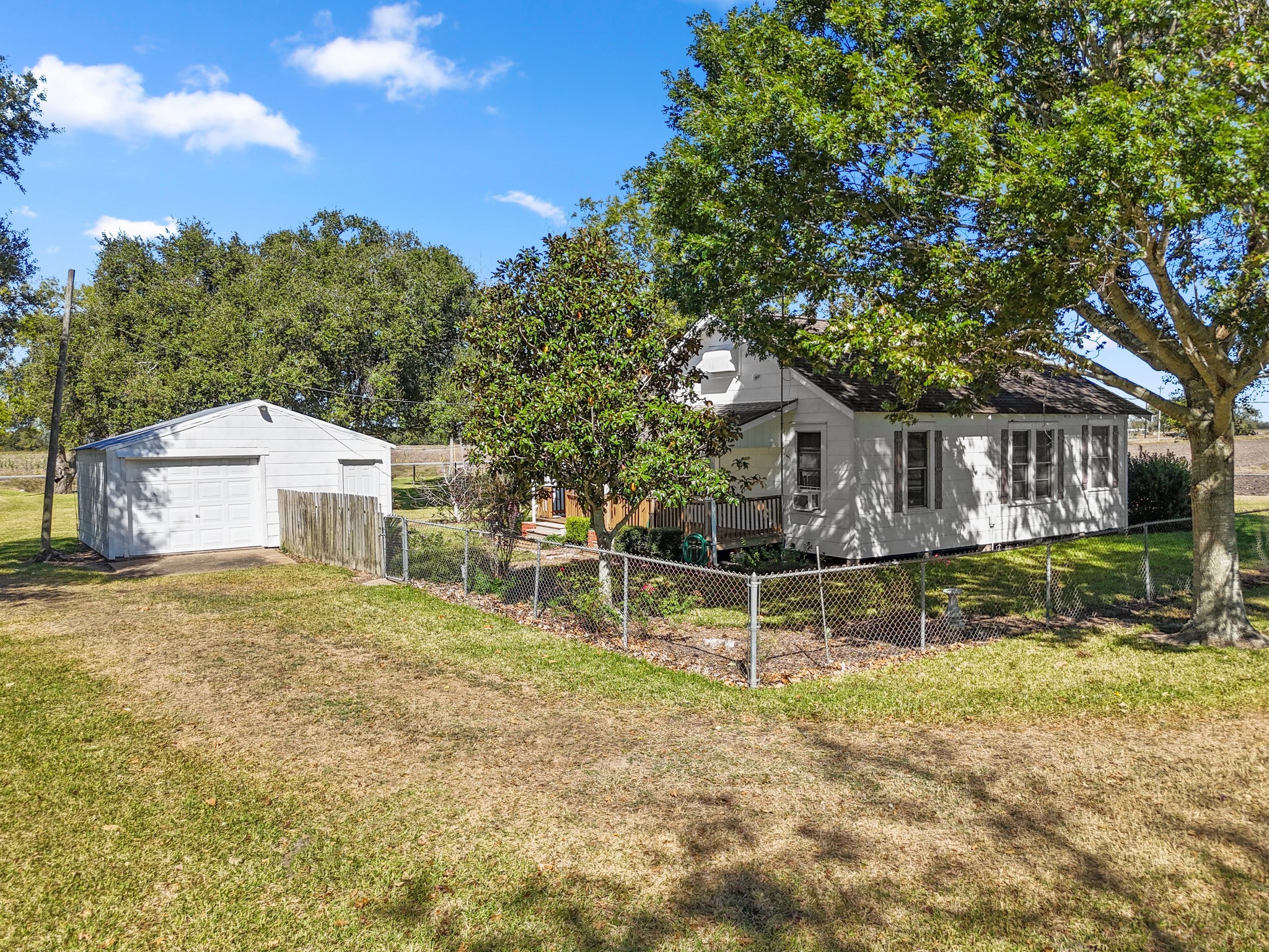 14309 Vrlla Road Guy, TX 77444 - Photo 11 of 41 front view of a house with a yard