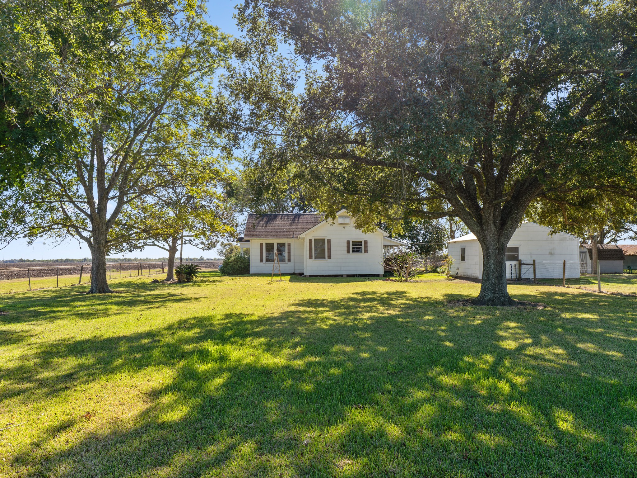 14309 Vrlla Road Guy, TX 77444 - Photo 19 of 41 a front view of a house with a yard