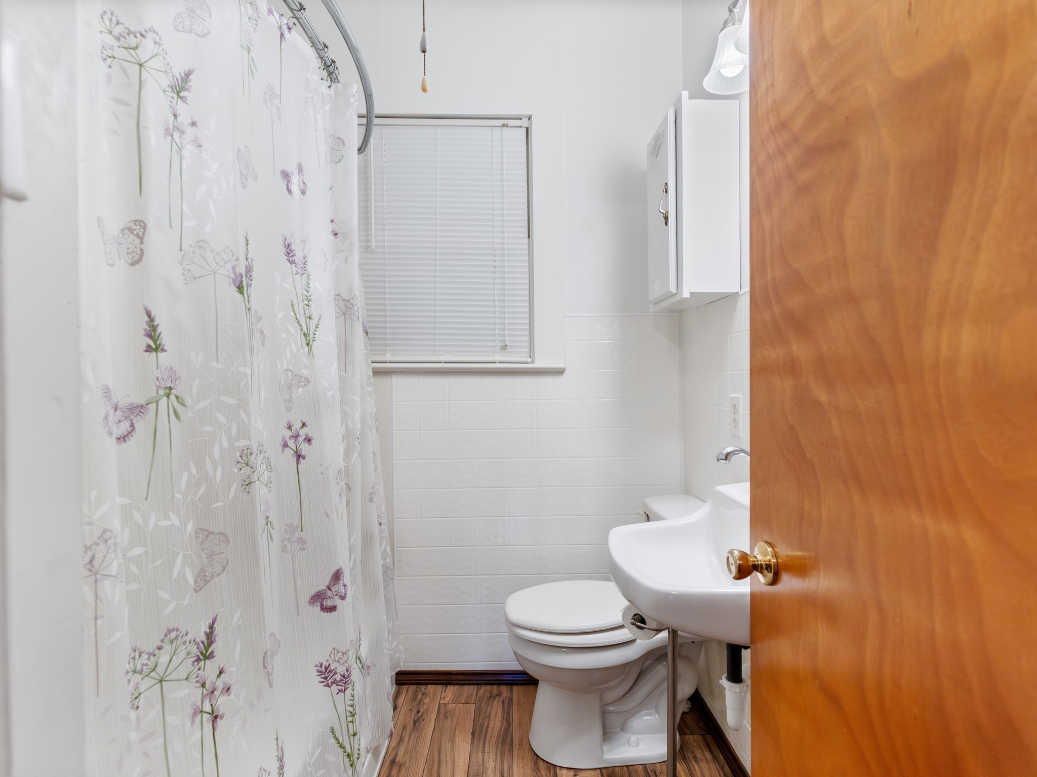 14309 Vrlla Road Guy, TX 77444 - Photo 29 of 41 a white toilet sitting next to a bathroom sink