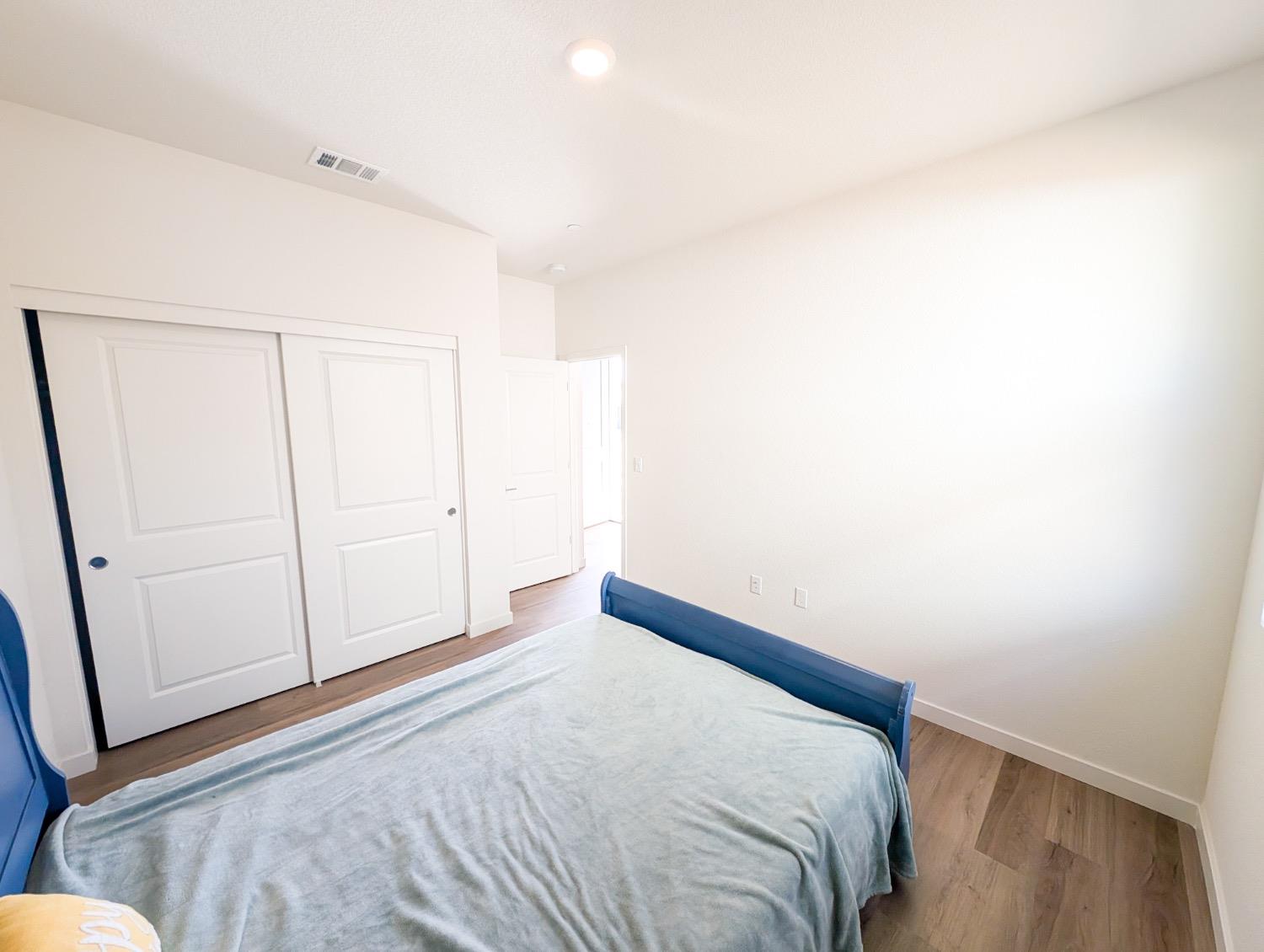 2129 Stagecoach Road Patterson, CA 95363 - Photo 7 of 23 a bed room with a bed