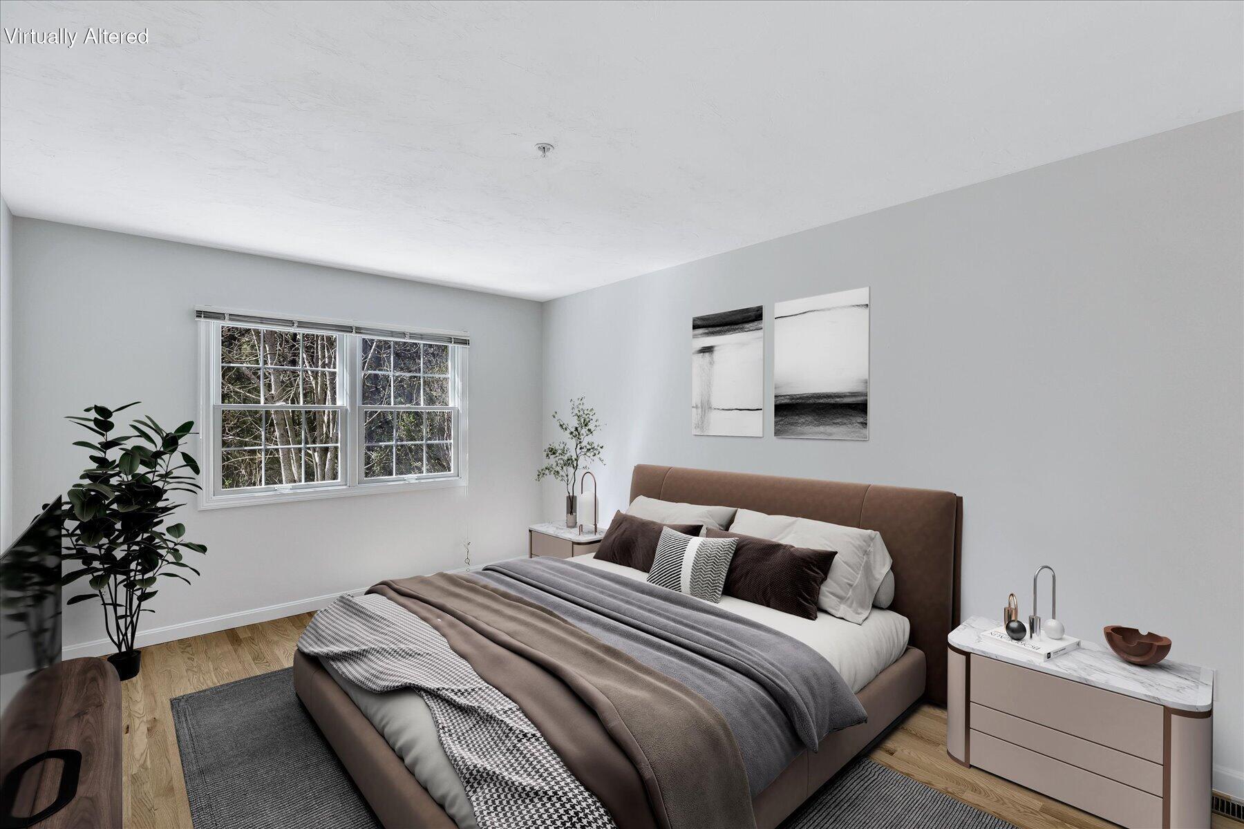 9 Red Cedar Road, Unit 9 Mashpee, MA 02649 - Photo 6 of 29 a bedroom with bed plant and window