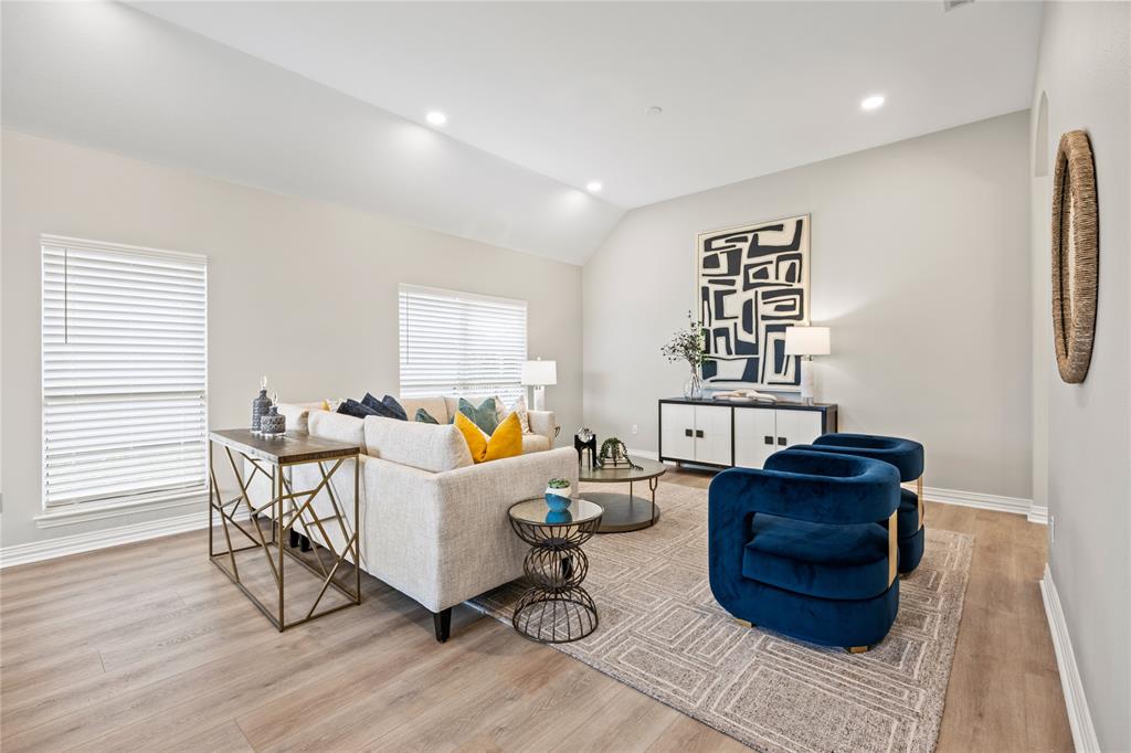 10409 Countryside Drive Denton, TX 76207 - Photo 7 of 38 Living area with light wood-style flooring, recessed lighting, and vaulted ceiling