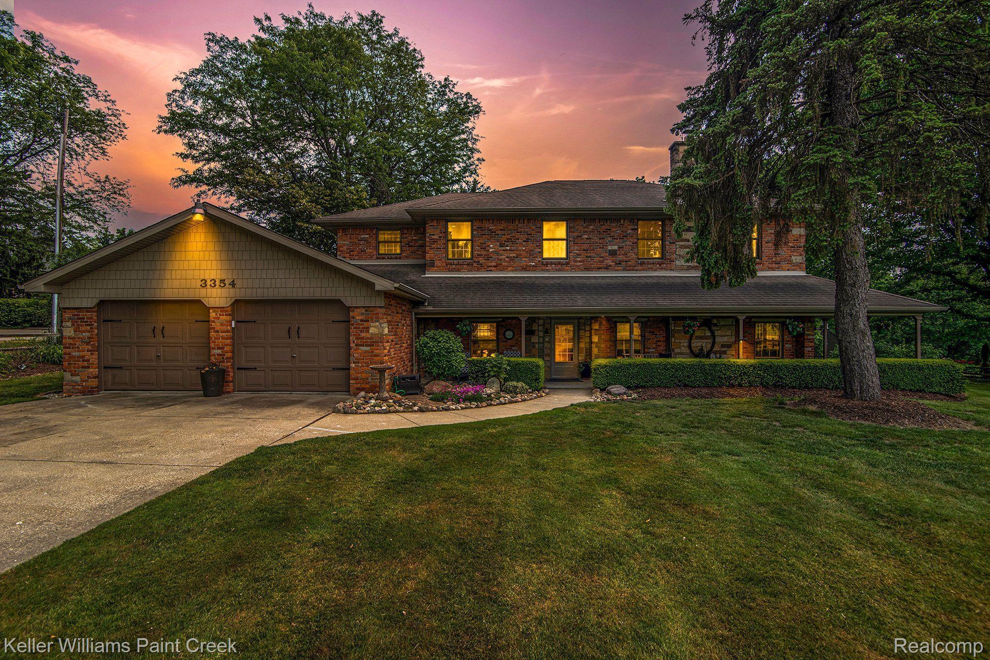 3354 East Cook Road Grand Blanc, MI 48439 - Photo 1 of 35 Nestled on a quiet, wooded lot on 1.72 acres.