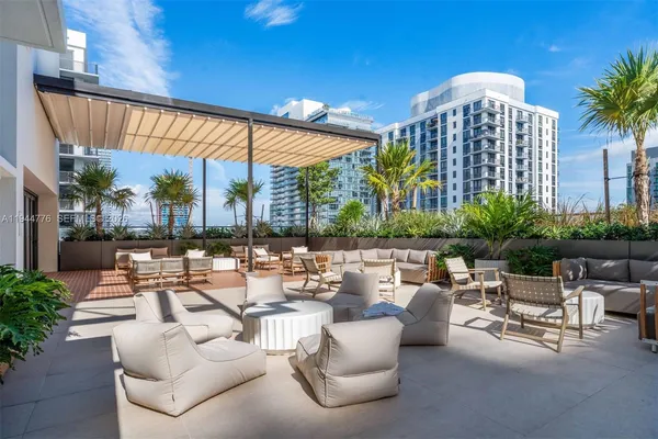 a building outdoor space with patio furniture