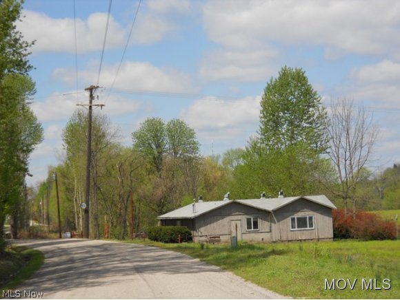 6149 Muskingum River Road Lowell, OH 45744 - Photo 5 of 24 Old Office Blding Across Road