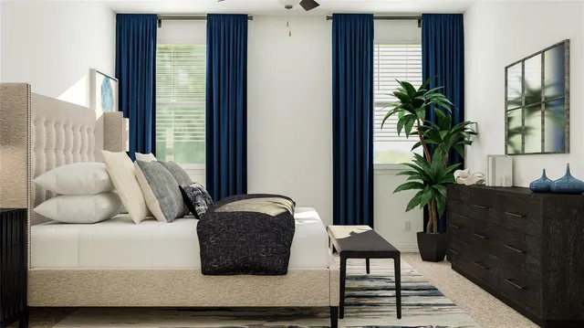 a bedroom with a bed and a dresser