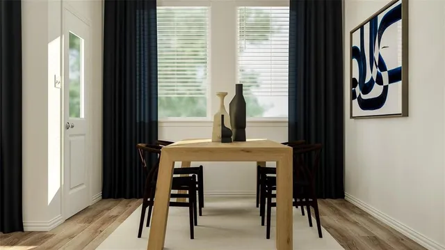 a dining room with furniture and window