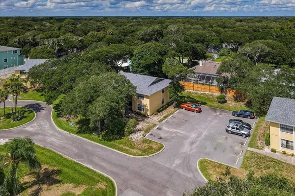 an aerial view of a house with garden