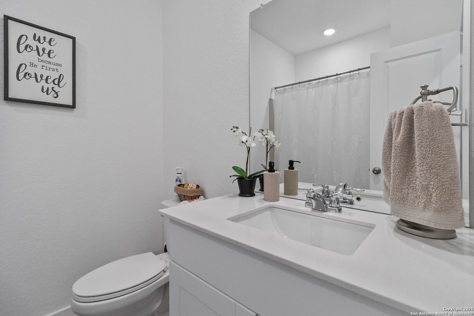 5708 Basil Chase St. Hedwig, TX 78152 - Photo 19 of 24 a bathroom with a sink toilet and shower