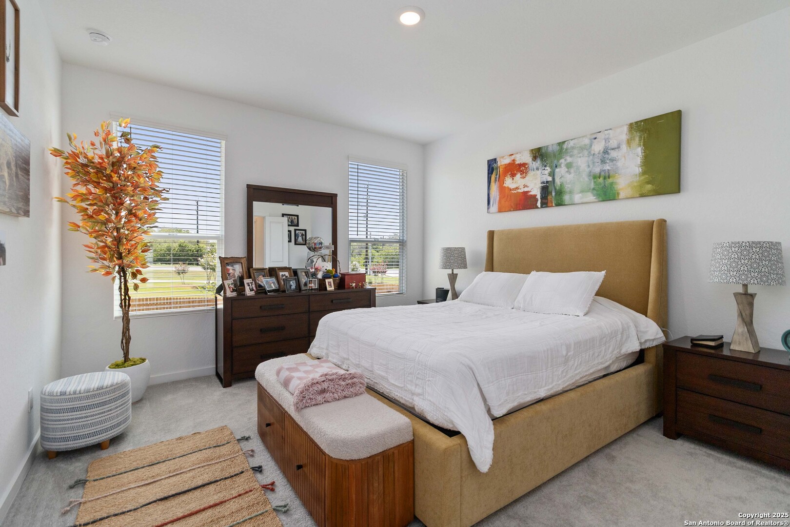 5708 Basil Chase St. Hedwig, TX 78152 - Photo 20 of 24 a bedroom with a bed and a couch