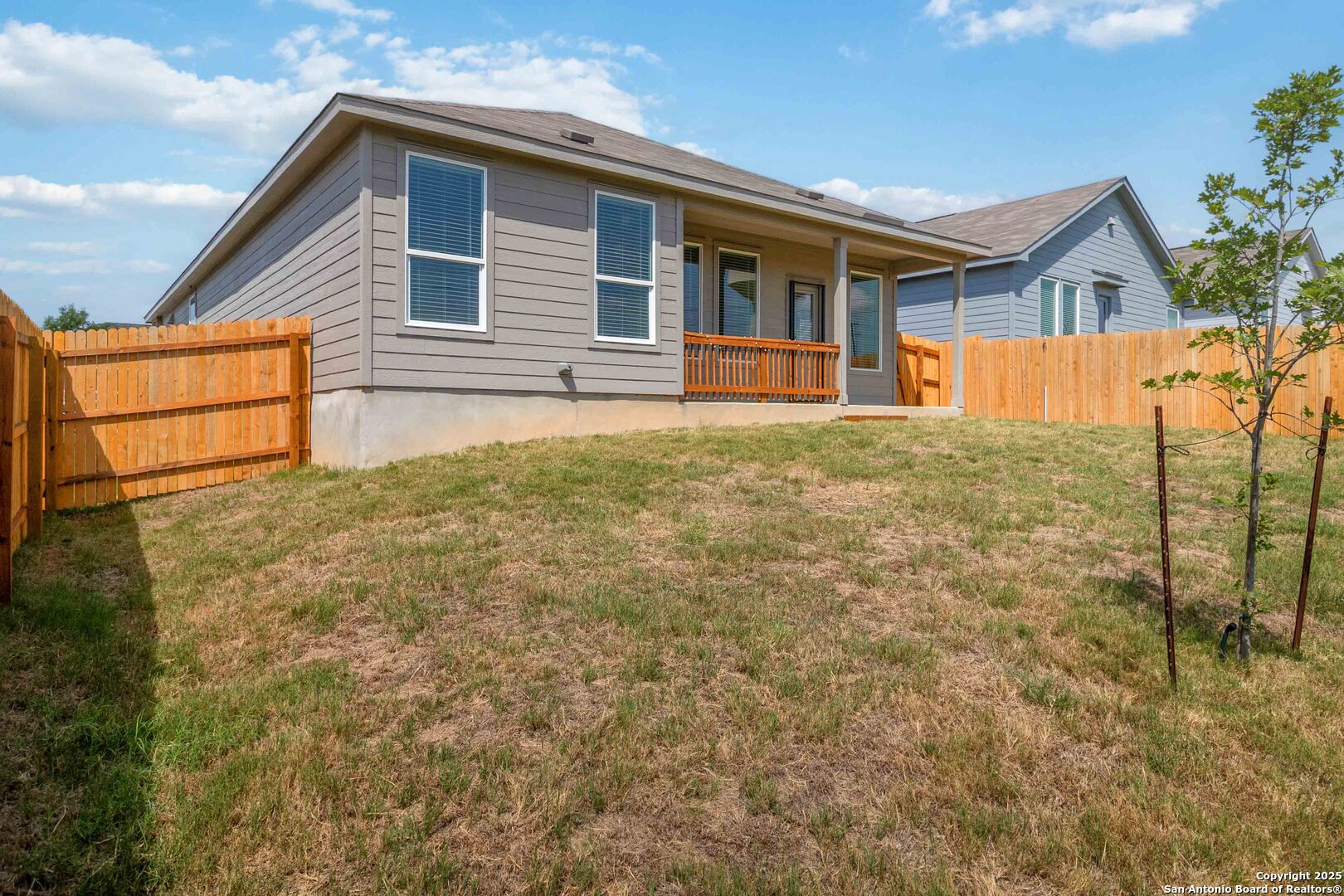 5708 Basil Chase St. Hedwig, TX 78152 - Photo 23 of 24 a front view of a house with a yard