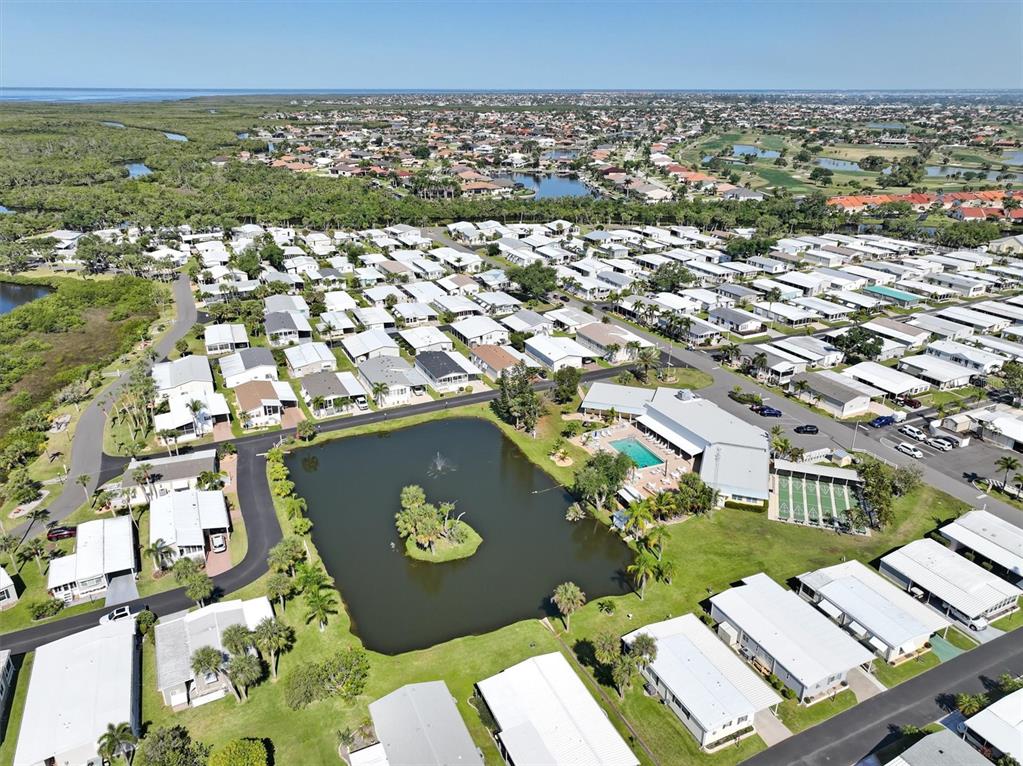 10303 Burnt Store Road, Unit 93 Punta Gorda, FL 33950 - Photo 40 of 65 an aerial view of a house