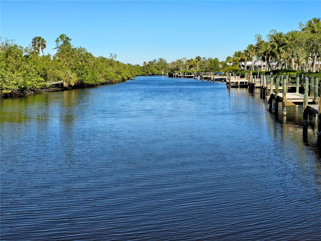 10303 Burnt Store Road, Unit 93 Punta Gorda, FL 33950 - Photo 56 of 65 a view of a lake with houses