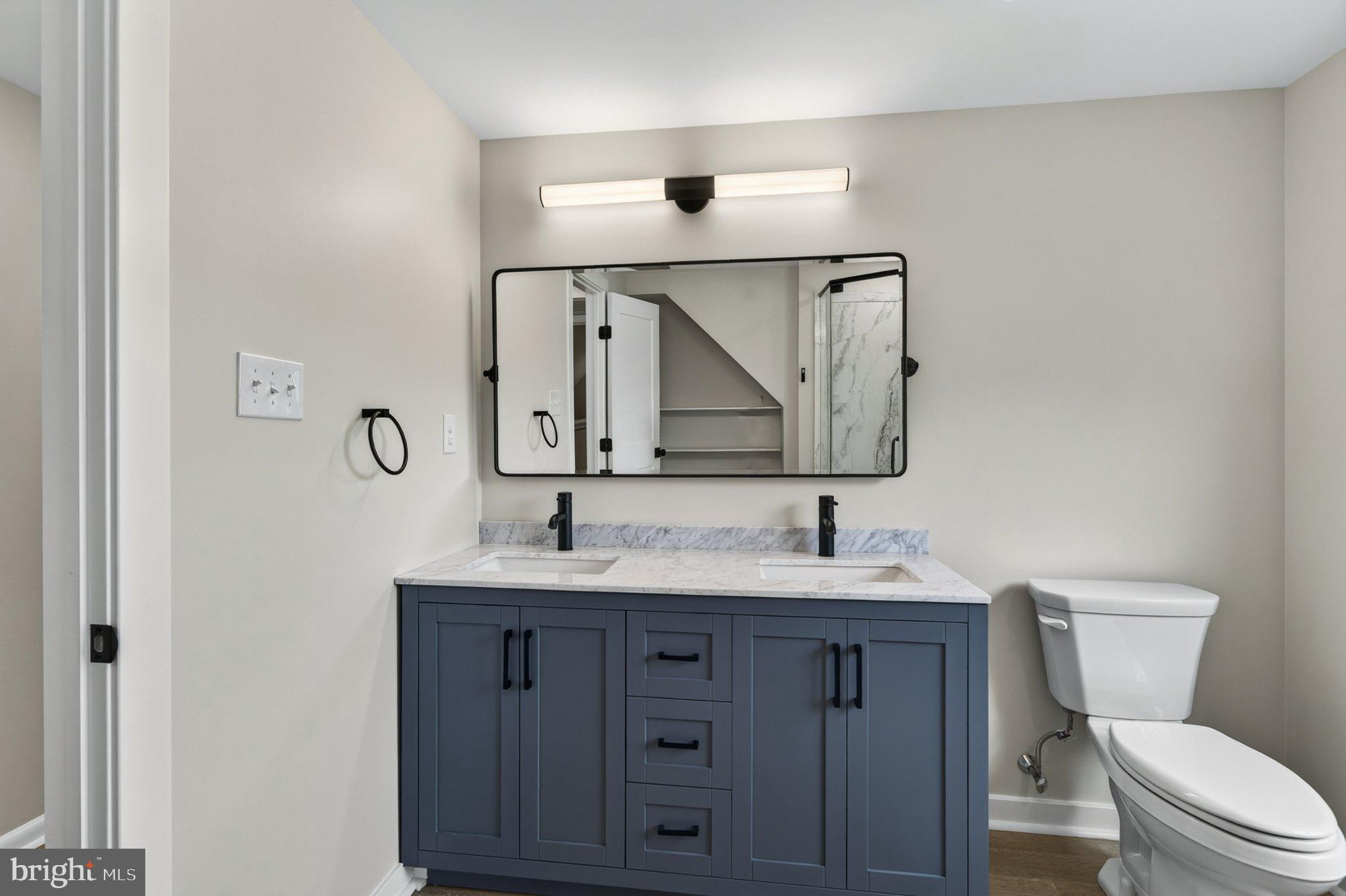 2069 Dutton Mill Road Newtown Square, PA 19073 - Photo 34 of 70 Sleek modern bathroom with dual sinks.