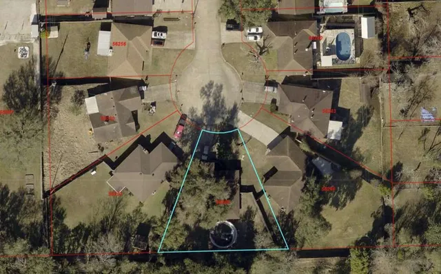 an aerial view of residential house with outdoor space