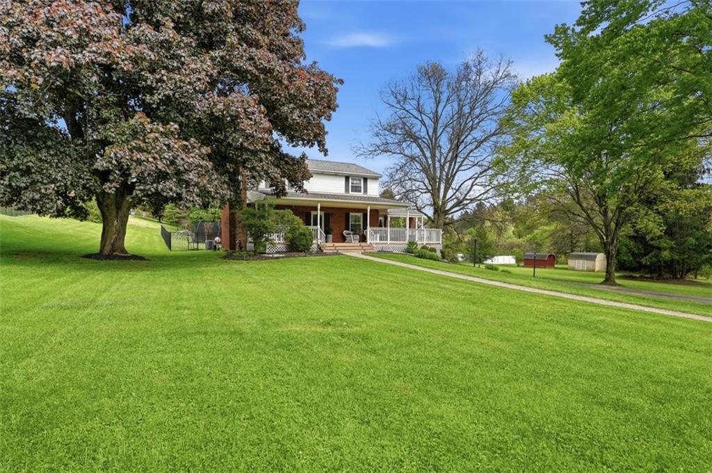 129 Meadowbrook Road Renfrew, PA 16053 - Photo 28 of 45 a view of a house with a big yard