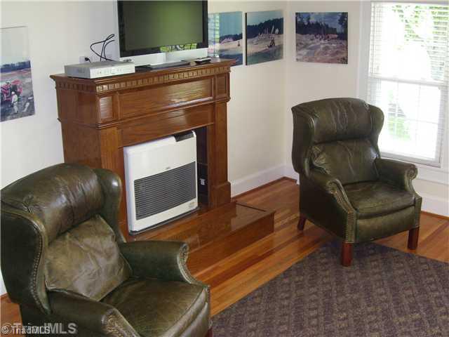 150 Ridge Road Mocksville, NC 27028 - Photo 15 of 16 Living Room. This room measures approx. 29x14 and the fireplace is actually a Monitor Heater.