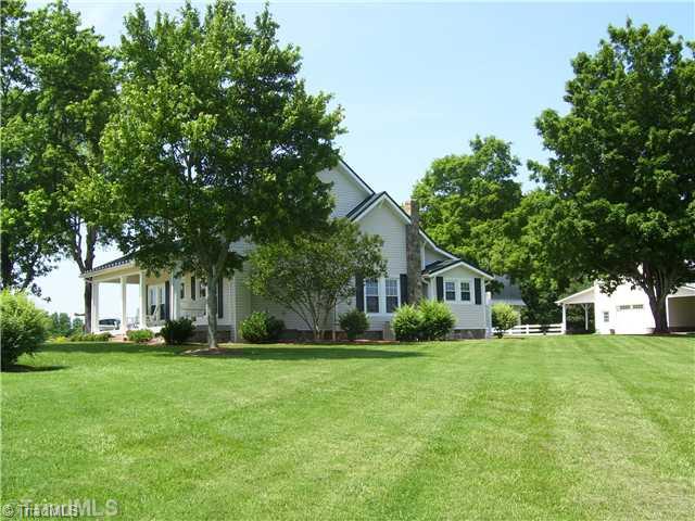 150 Ridge Road Mocksville, NC 27028 - Photo 3 of 16 Exterior Front. What a great place to call home. Wait till you see the surroundings. Great place for a BIG Family Reunion or Wedding.