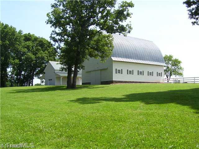 150 Ridge Road Mocksville, NC 27028 - Photo 4 of 16 Stable/Barn. Absolutely Beautiful. Bring the horses and enjoy great country living. Some fencing.