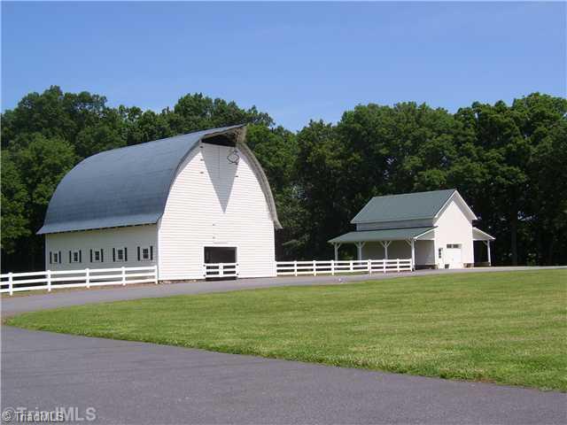 150 Ridge Road Mocksville, NC 27028 - Photo 5 of 16 Stable/Barn. Wedding pictures have been made here. Note the circle drive. Both have a stone foundation. The Detached Garage was recenly builtt with a large upstairs storage area. ( power and water)